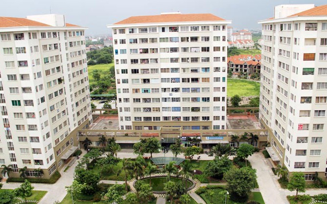 Hanoi determined to resolve issues in social housing development- Ảnh 1.