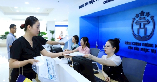 Hà Nội tổ chức lại Trung tâm Phục vụ hành chính công Thành phố- Ảnh 1.