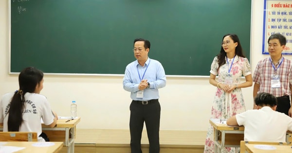 Ngày đầu kỳ thi vào lớp 10 THPT tại Hà Nội diễn ra an toàn, nghiêm túc- Ảnh 1.