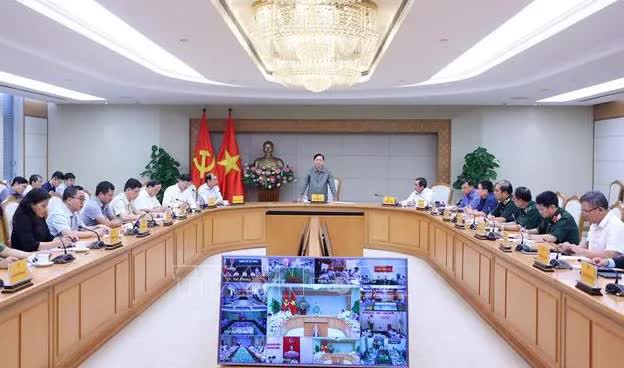Phó Thủ tướng Chính phủ Trần Hồng Hà họp chỉ đạo ứng phó bão số 3 (WIPHA)- Ảnh 1.