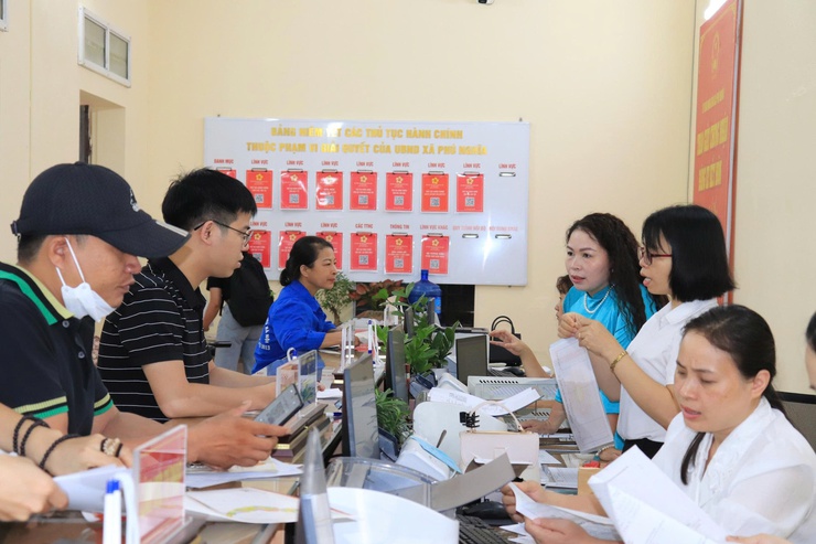 Phú Nghĩa phát động phong trào thi đua “Cải cách hành chính đồng bộ - Chính quyền phục vụ Nhân dân” năm 2026- Ảnh 2.