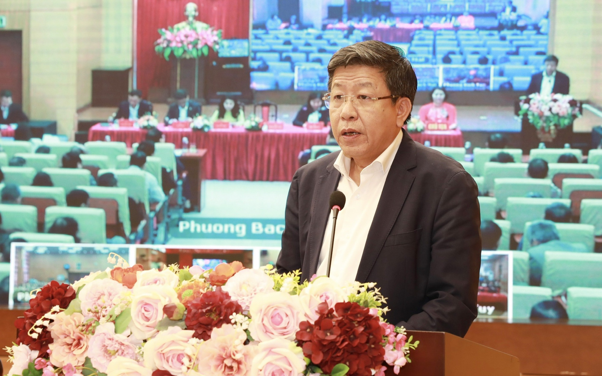 Phó Chủ tịch Thường trực UBND Thành phố Dương Đức Tuấn trình bày Chương trình hành động tại Hội nghị