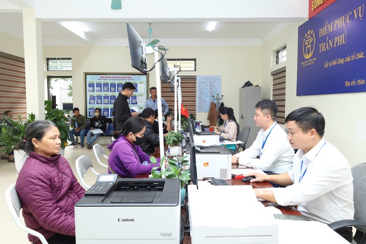 Công tác cải cách hành chính và chuyển đổi số tại xã Trần Phú: Hành trình đột phá từ vùng quê ngoại thành- Ảnh 1.