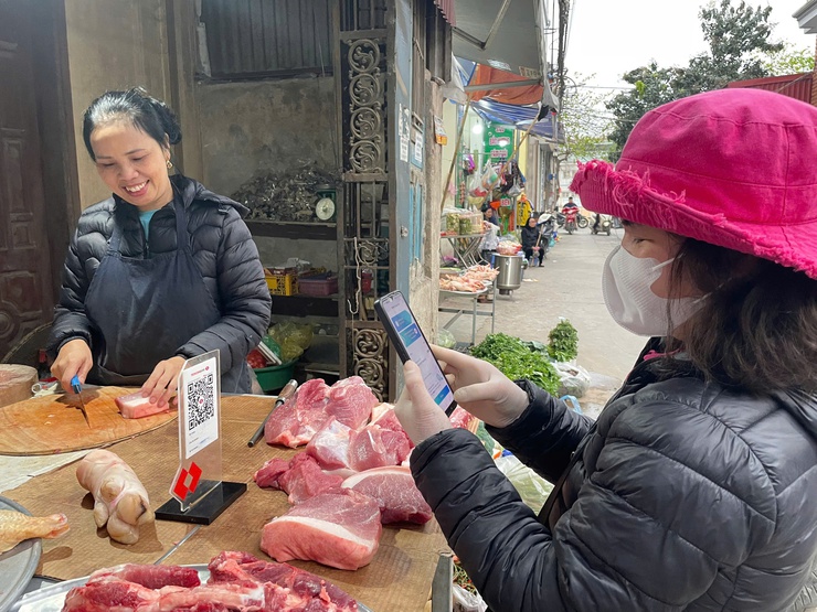 Huyện Mê Linh nhân rộng mô hình chợ, tuyến phố thanh toán không dùng tiền mặt- Ảnh 1.