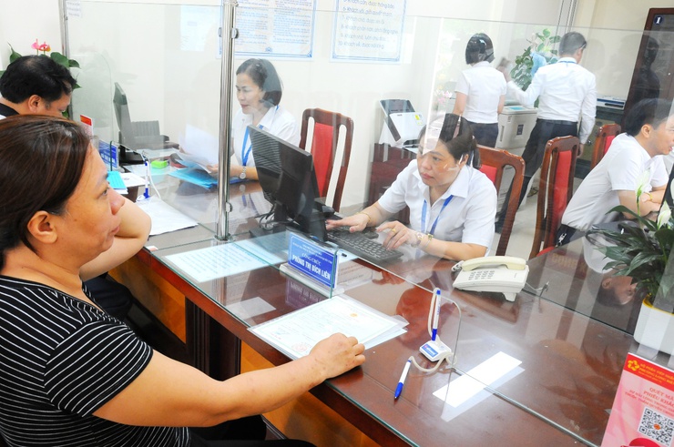 Hanoi focuses on key tasks to implement two-tier local government model- Ảnh 1.