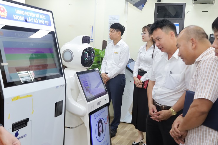 Trung tâm Phục vụ hành chính công Thành phố và UBND xã Mỹ Đức ký kết hợp tác hỗ trợ hoạt động chuyển đổi số, dịch vụ công trực tuyến- Ảnh 3.