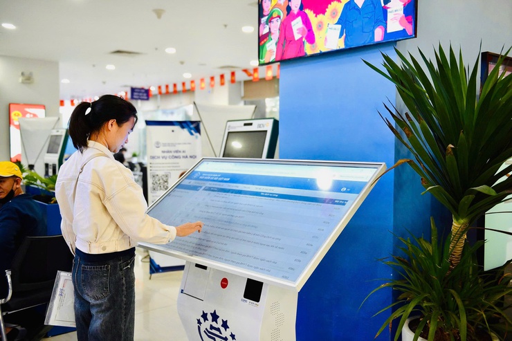 Hà Nội triển khai 10 thủ tục BHXH, BHYT toàn trình từ 16/3- Ảnh 2.