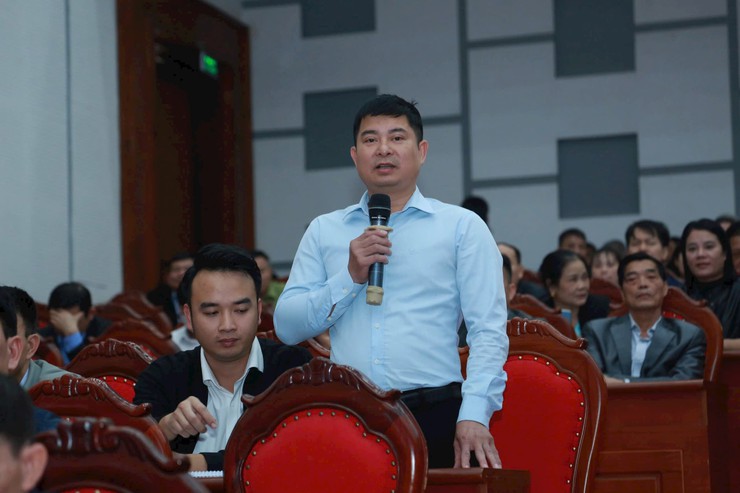 Hanoi People's Council candidates meet voters and present action programs in Quang Minh Commune- Ảnh 3.