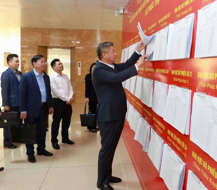 Phó Chủ tịch UBND Thành phố Nguyễn Mạnh Quyền kiểm tra công tác chuẩn bị bầu cử tại 3 xã Phúc Thọ, Phúc Lộc, Hát Môn- Ảnh 7.