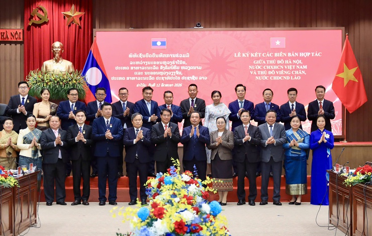 Hà Nội ký kết 7 biên bản ghi nhớ hợp tác với Thủ đô Viêng Chăn, Lào- Ảnh 7.