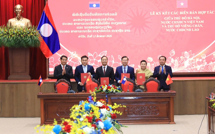 Hà Nội ký kết 7 biên bản ghi nhớ hợp tác với Thủ đô Viêng Chăn, Lào- Ảnh 4.