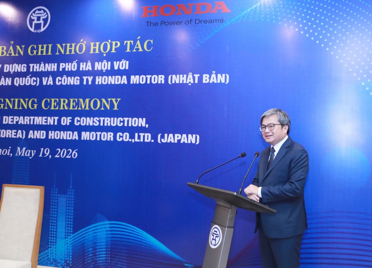 Hà Nội ký biên bản ghi nhớ hợp tác triển khai Dự án lắp đặt trạm đổi pin cho xe máy điện- Ảnh 1.