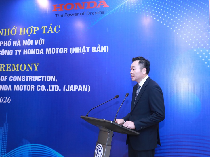 Hà Nội ký biên bản ghi nhớ hợp tác triển khai Dự án lắp đặt trạm đổi pin cho xe máy điện- Ảnh 2.
