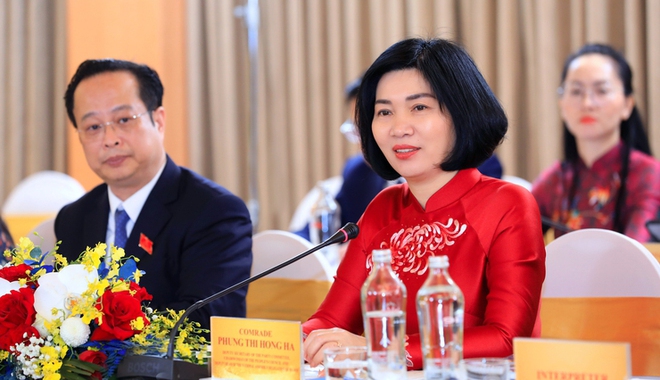 Hanoi and Vientiane share experience on elected council operations